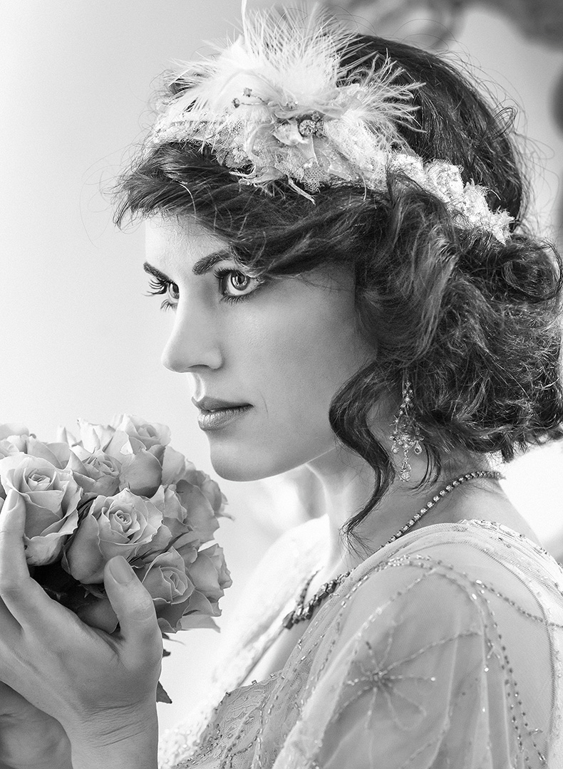 B/W photographic portrait of model wearing vimtage wedding accessories
